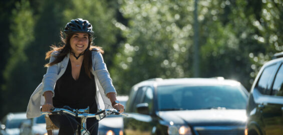 Woman commuting in a cycling lane